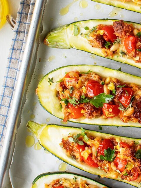 Zucchini Boats with Olives and Pine Nuts - Foodies Can Cook